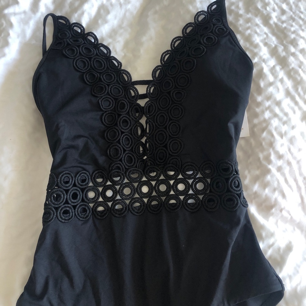 Never worn black cut out one piece